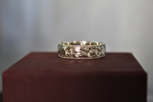 7mm solid sterling silver and hand engraved comfort band with milgrain border
