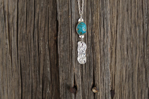 Turquoise pendant with engraved bar