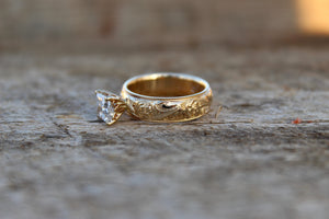 14k yellow gold engraved 6mm band with a 1.4 carat lab grown princess cut diamond